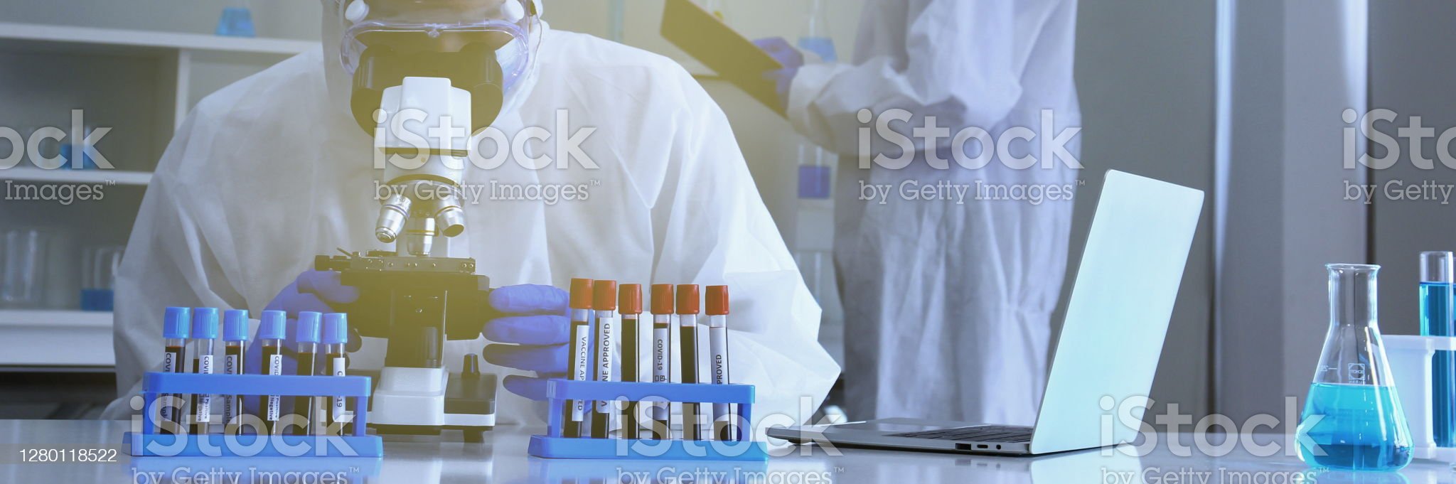 doctor in virus protective suit working