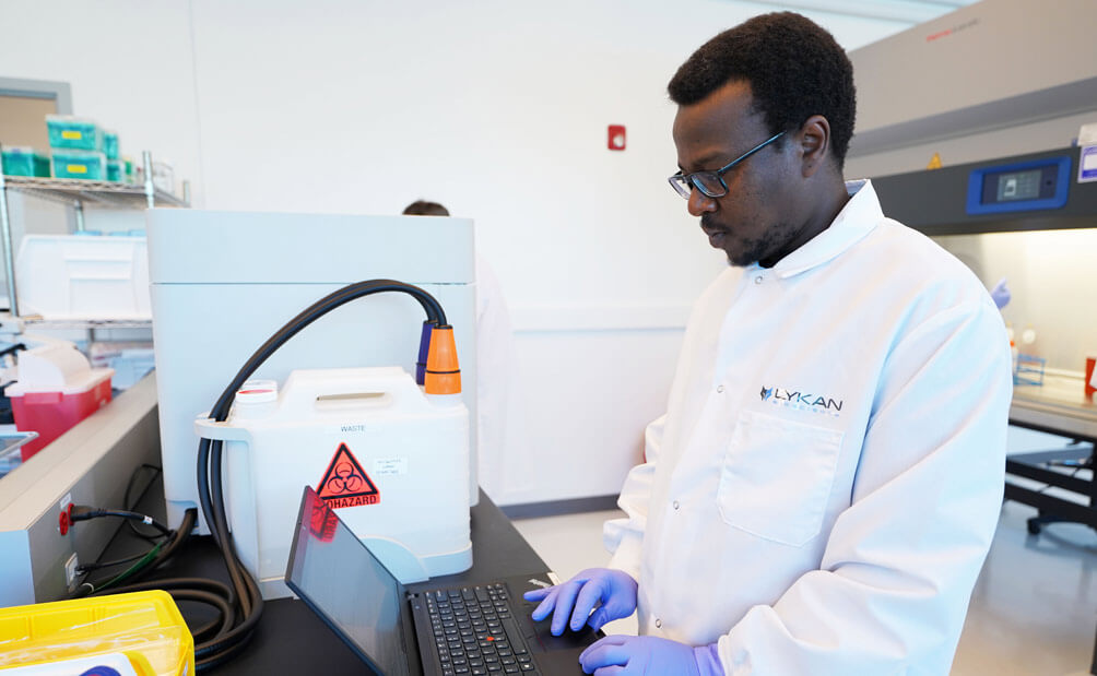 Lykan scientist working biohazard materials