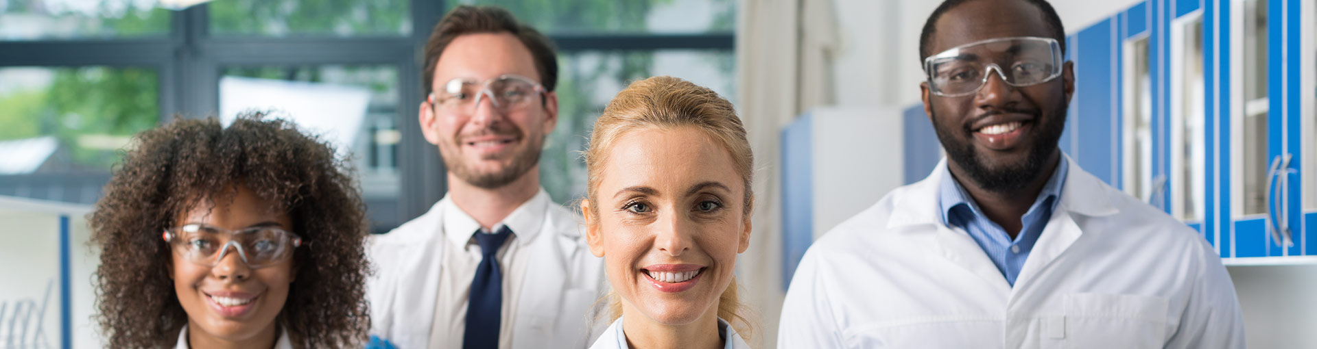 group of Lykan professionals smiling at camera