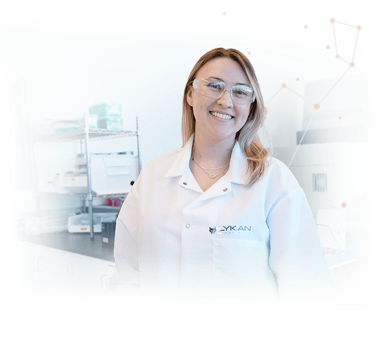 scientist in cell therapy smiling at camera