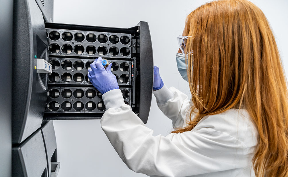 Cell therapy quality control scientist in lab.